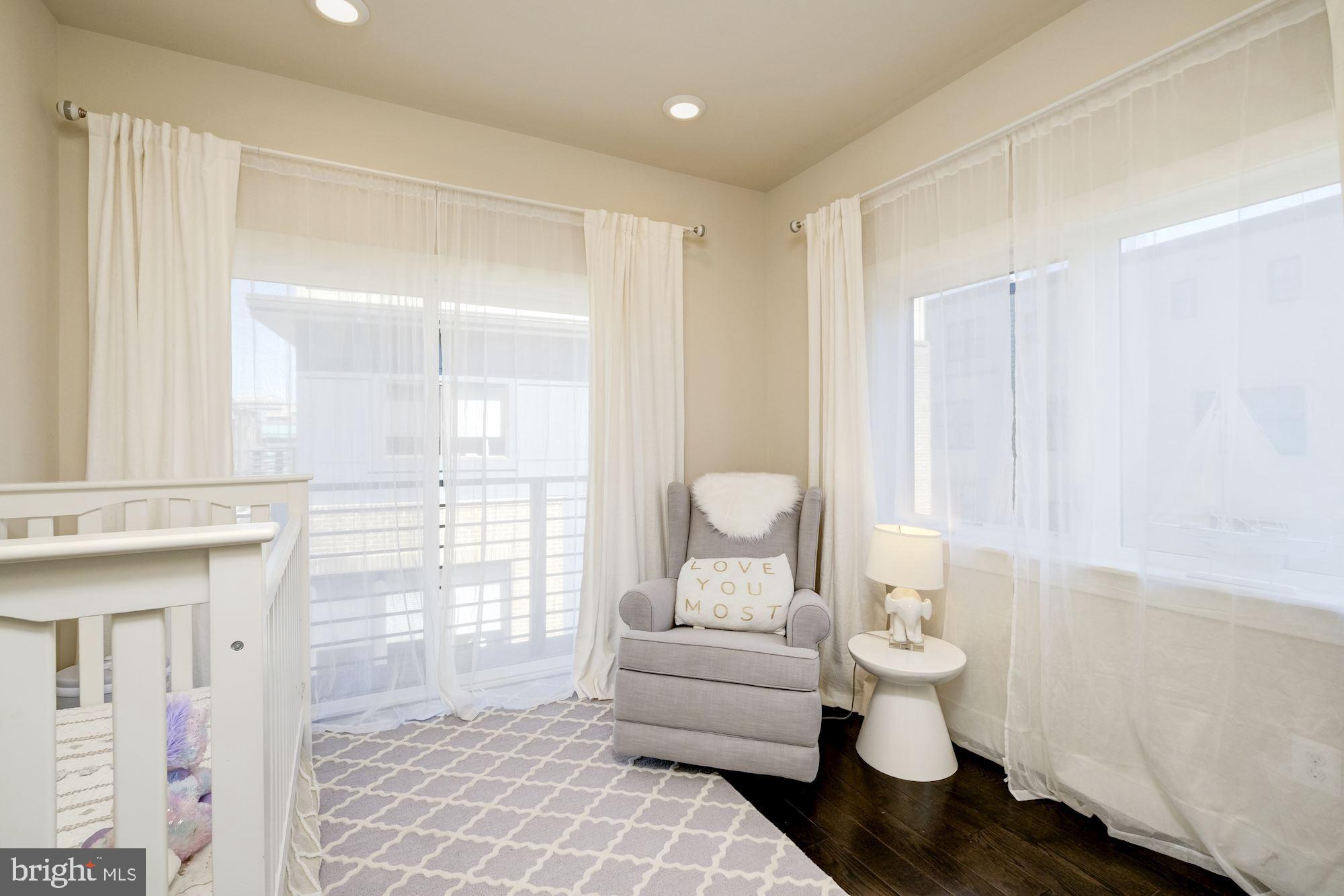 6640 Eames Way Bethesda, MD 20817 - Photo 23 of 38 a bathroom with a sink toilet and shower