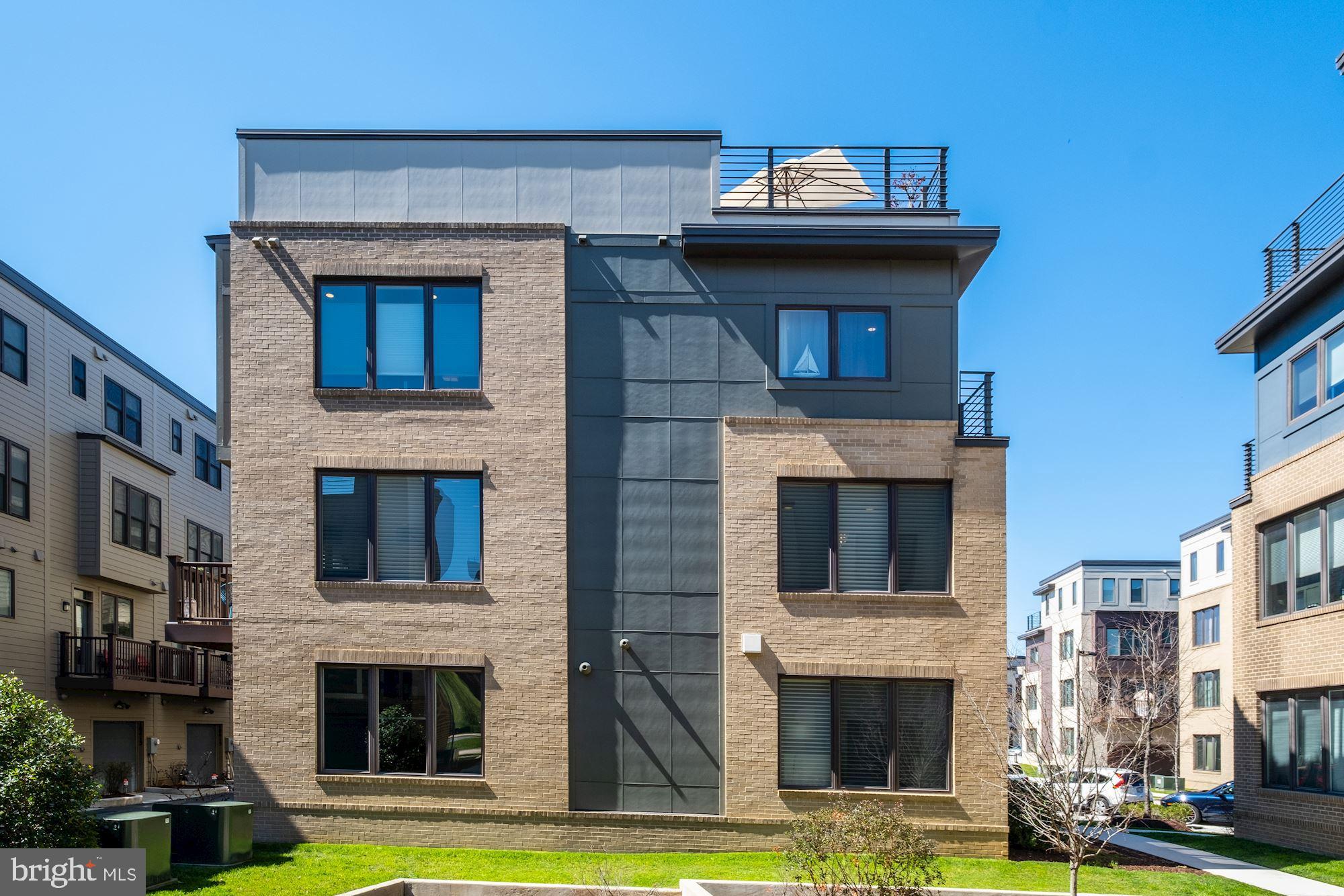 6640 Eames Way Bethesda, MD 20817 - Photo 32 of 38 a view of building with yard
