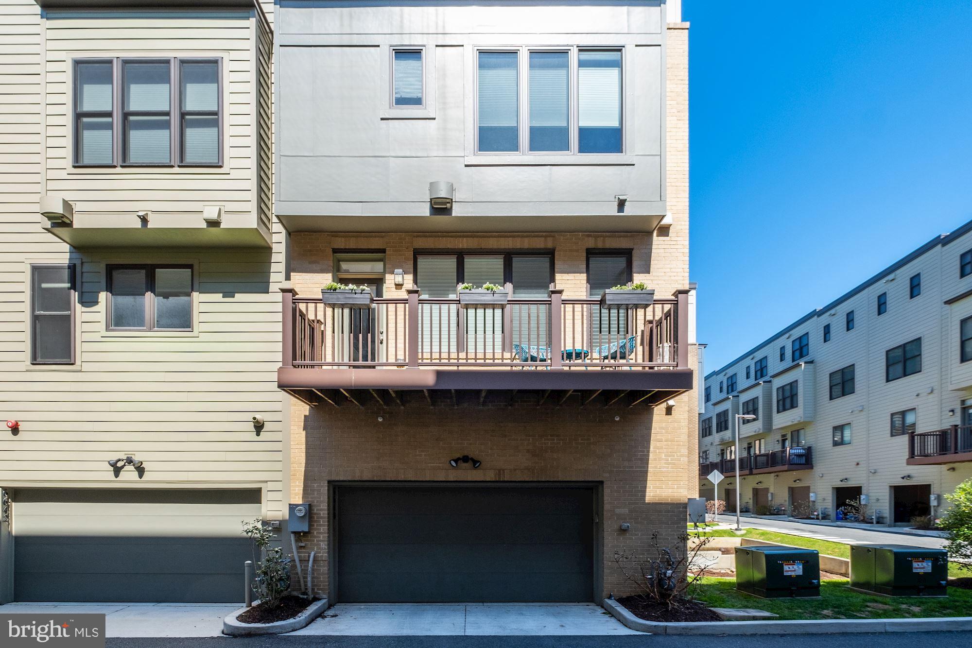 6640 Eames Way Bethesda, MD 20817 - Photo 34 of 38 a front view of building with yard