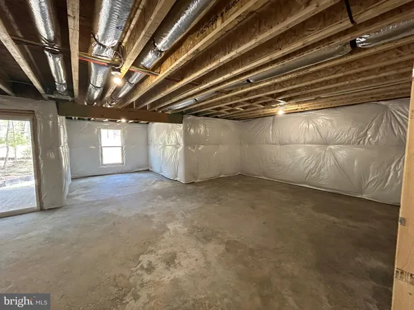 a view of empty room with windows