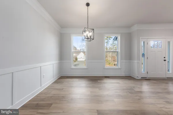 a view of livingroom with hardwood floor and window
