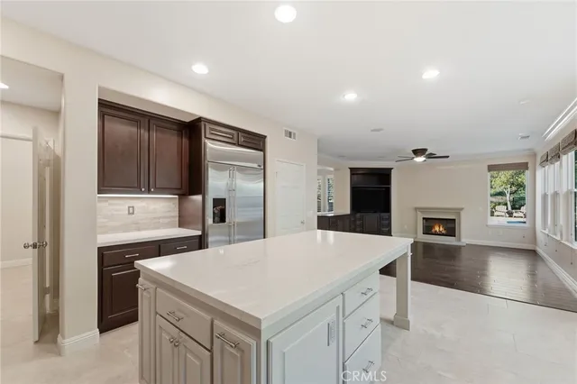 a kitchen with a stove a refrigerator and a stove