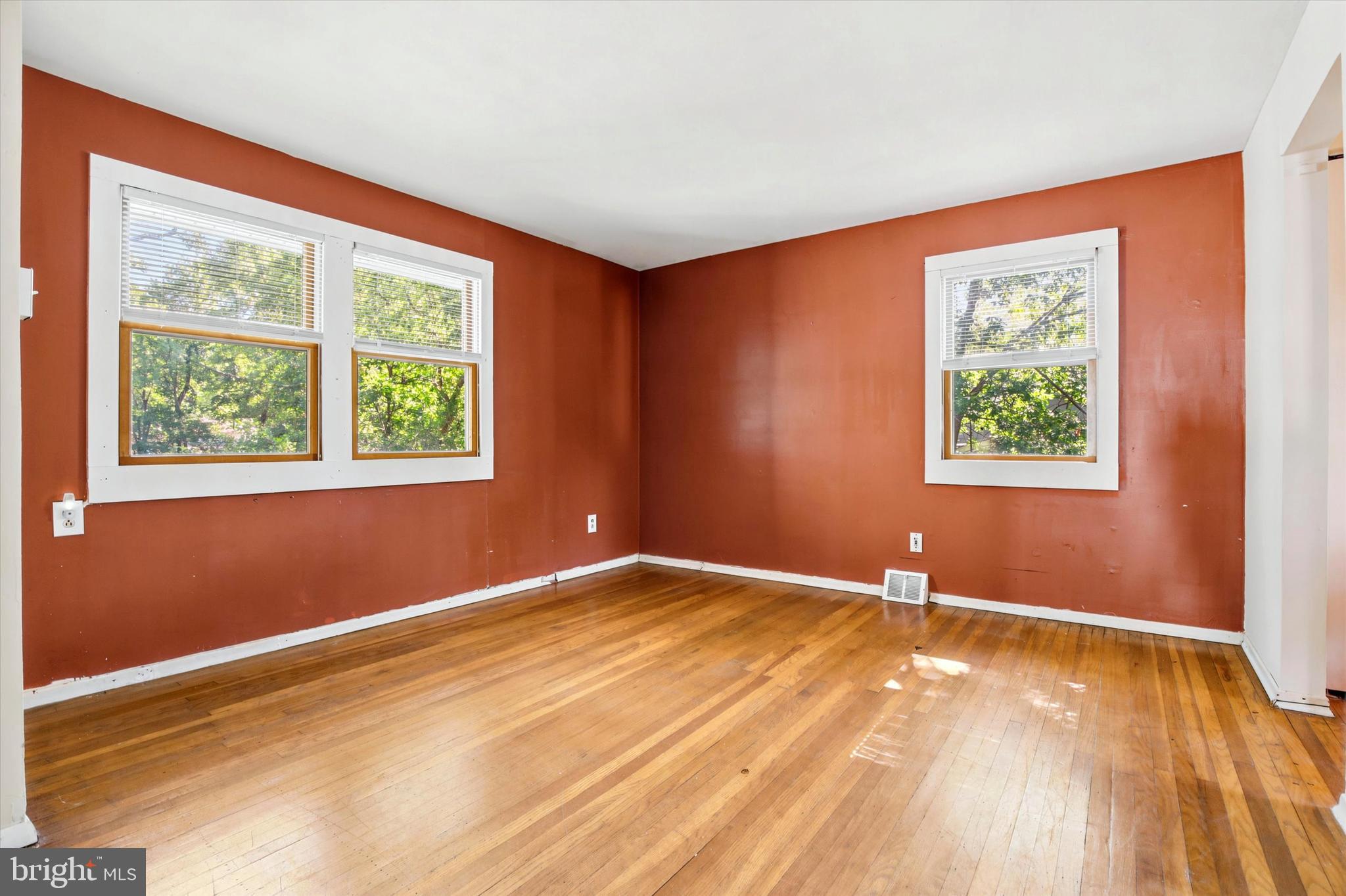 1167 Cushmore Road Southampton, PA 18966 - Photo 15 of 25 a view of an empty room with wooden floor and a window