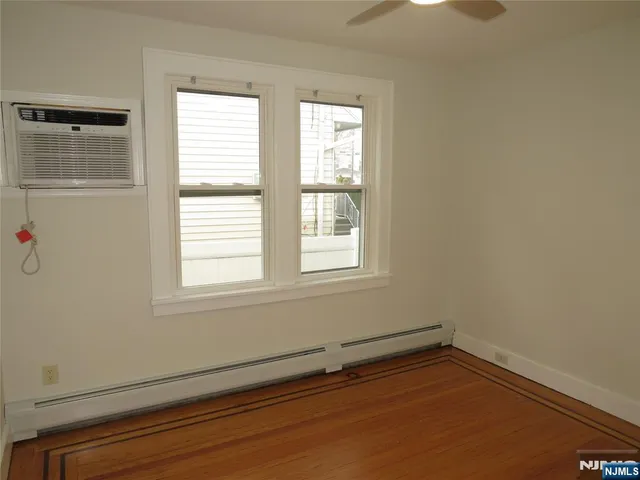 a view of a room that has a window in it