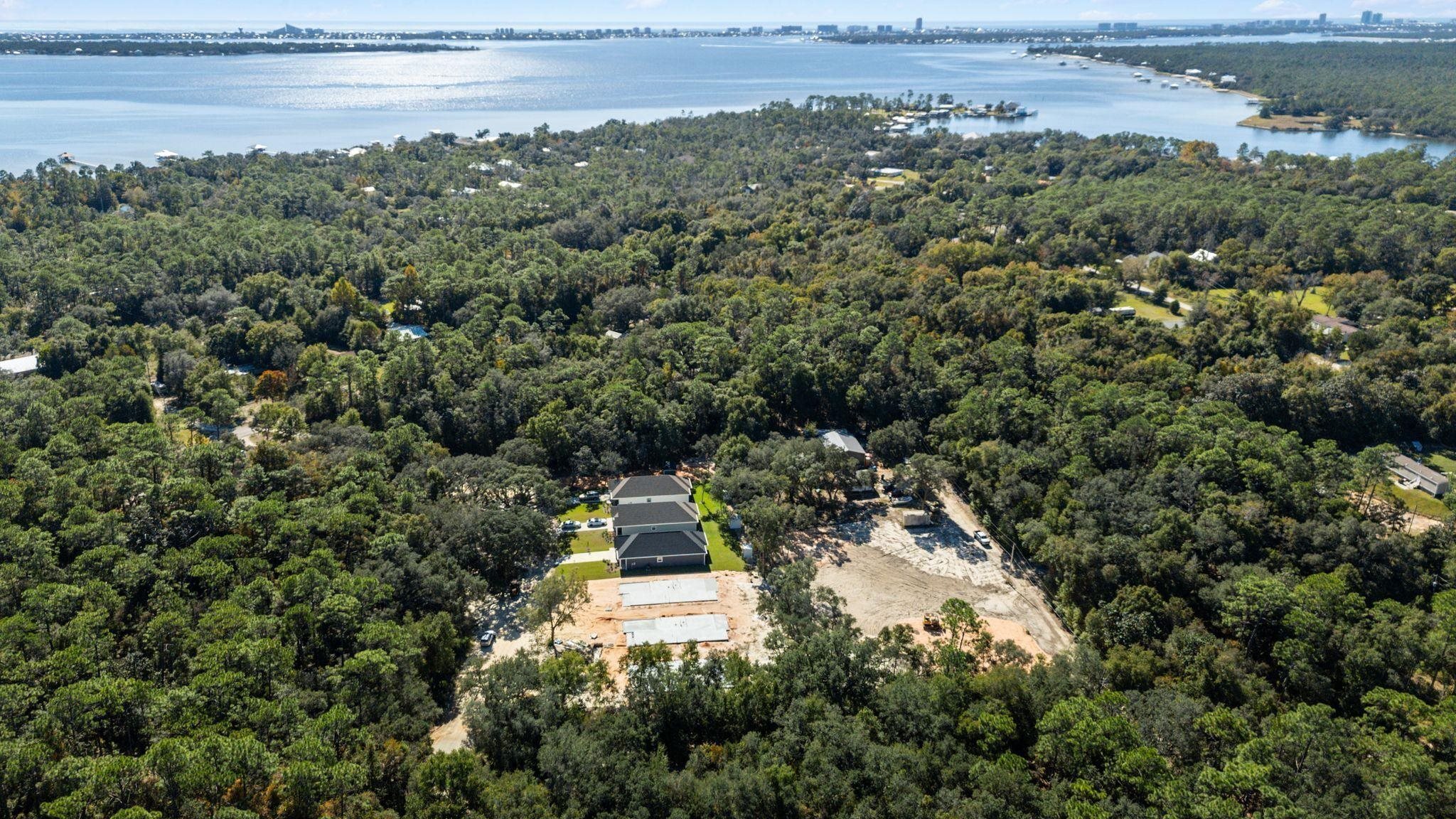 8657 Anniston Drive Elberta, AL 36530 - Photo 15 of 21 Bird's eye view of a heavily wooded area and a large body of water