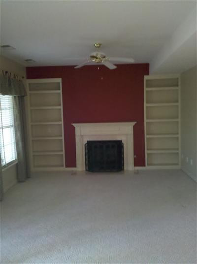 781 Laurel Hill Road Lexington, KY 40504 - Photo 15 of 38 Great room with gas fireplace and shelvi