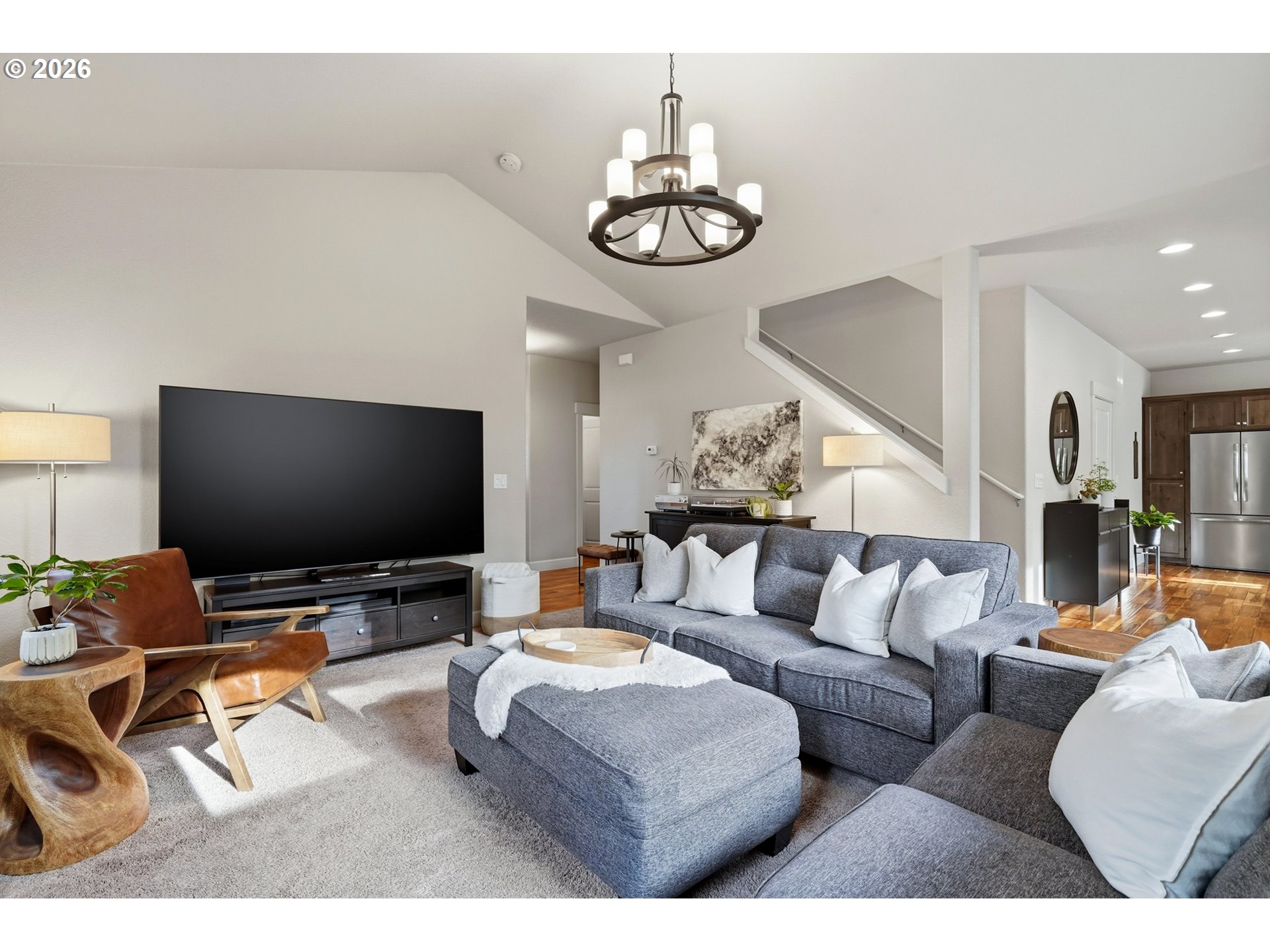 17390 Aubin Street Sandy, OR 97055 - Photo 12 of 41 a living room with furniture and a flat screen tv
