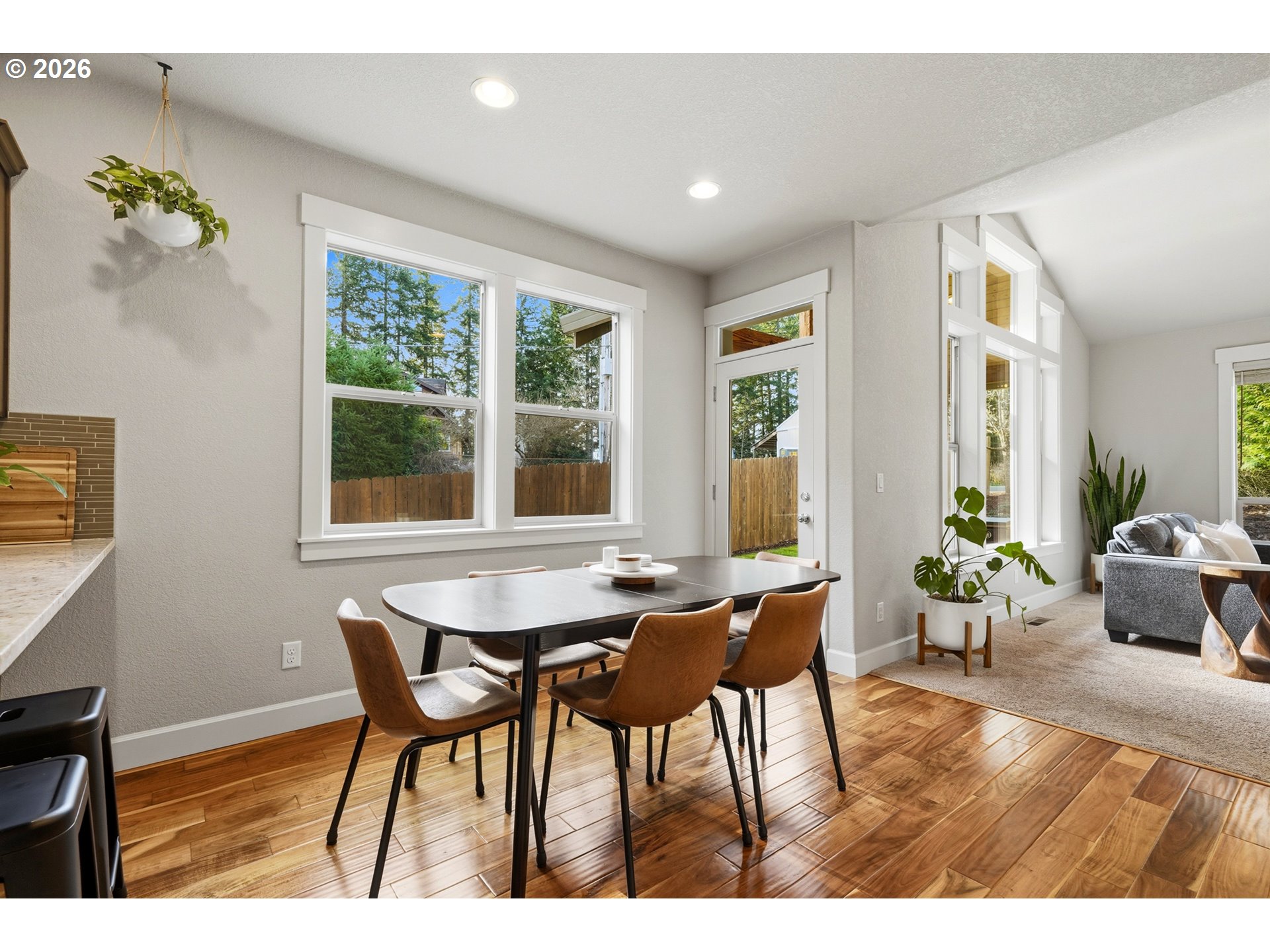 17390 Aubin Street Sandy, OR 97055 - Photo 15 of 41 a view of a dining room with furniture window and wooden floor