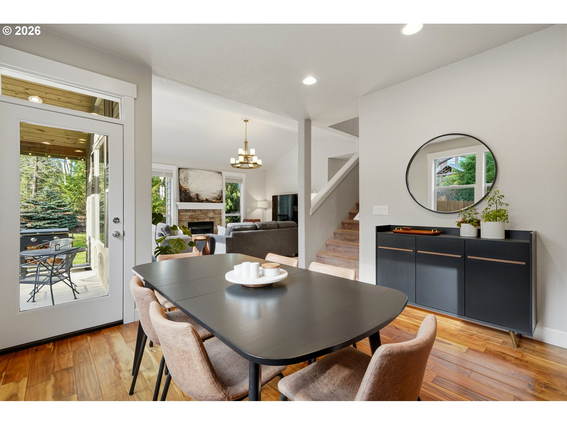 17390 Aubin Street Sandy, OR 97055 - Photo 16 of 41 a view of a dining room with furniture and wooden floor