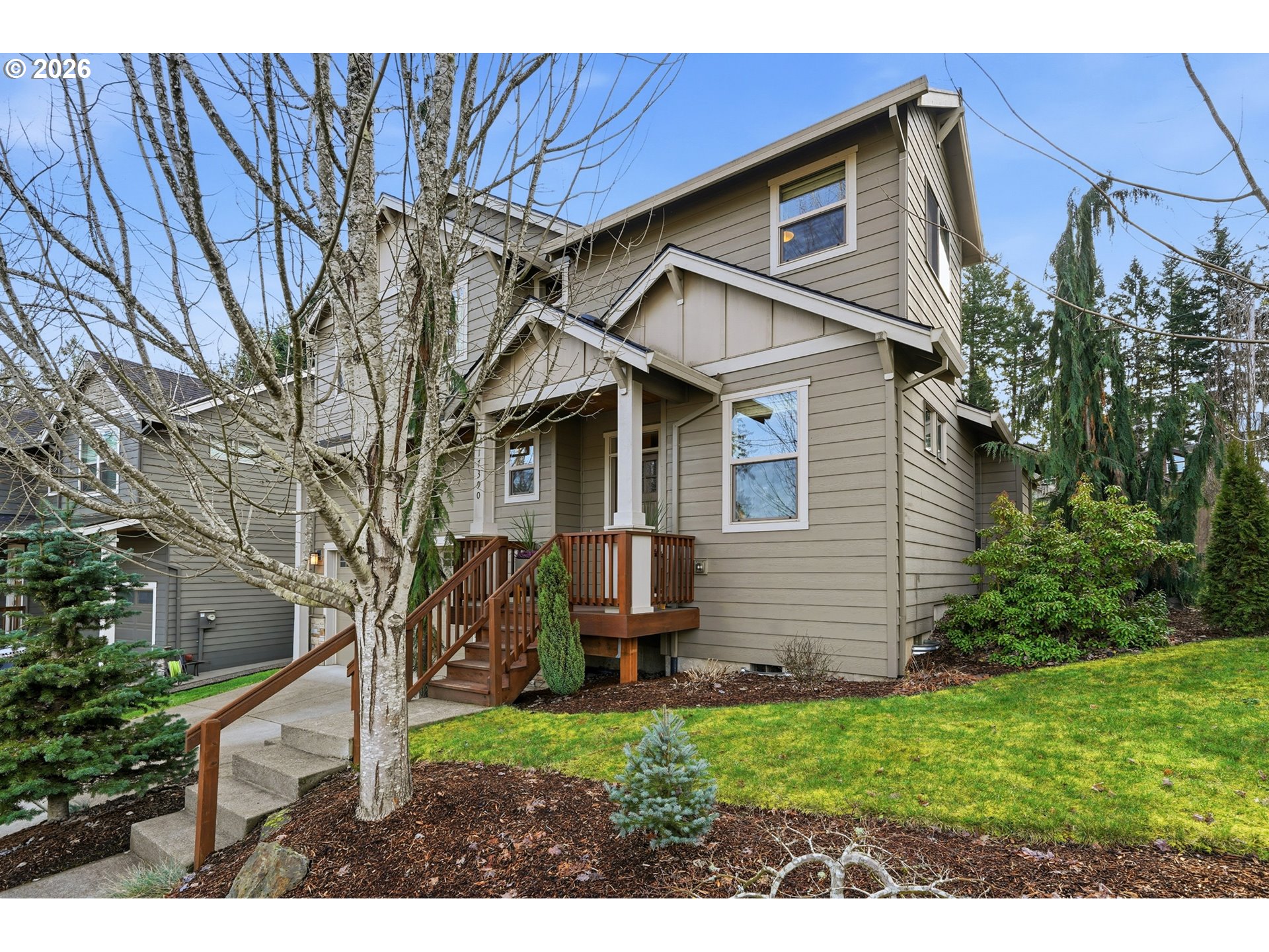 17390 Aubin Street Sandy, OR 97055 - Photo 2 of 41 a front view of a house with a yard