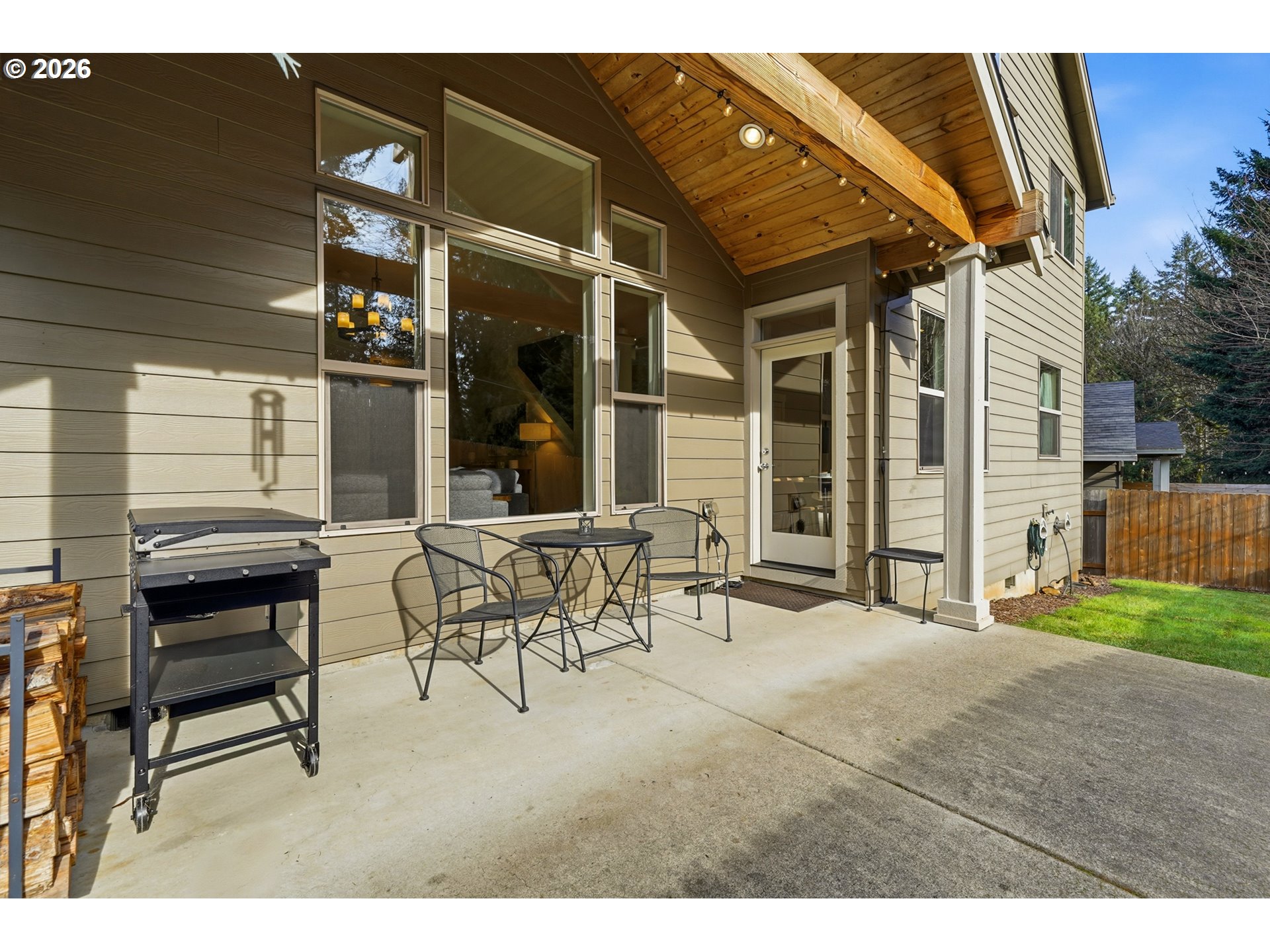 17390 Aubin Street Sandy, OR 97055 - Photo 33 of 41 a view of a patio with table and chairs