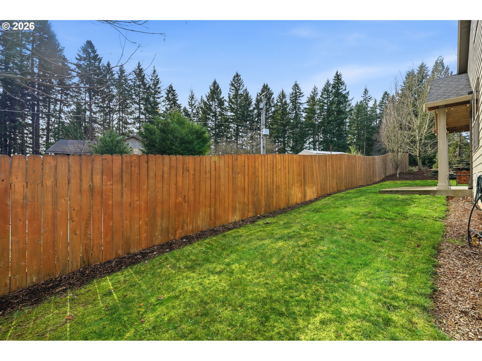 17390 Aubin Street Sandy, OR 97055 - Photo 36 of 41 a view of a backyard with of a house