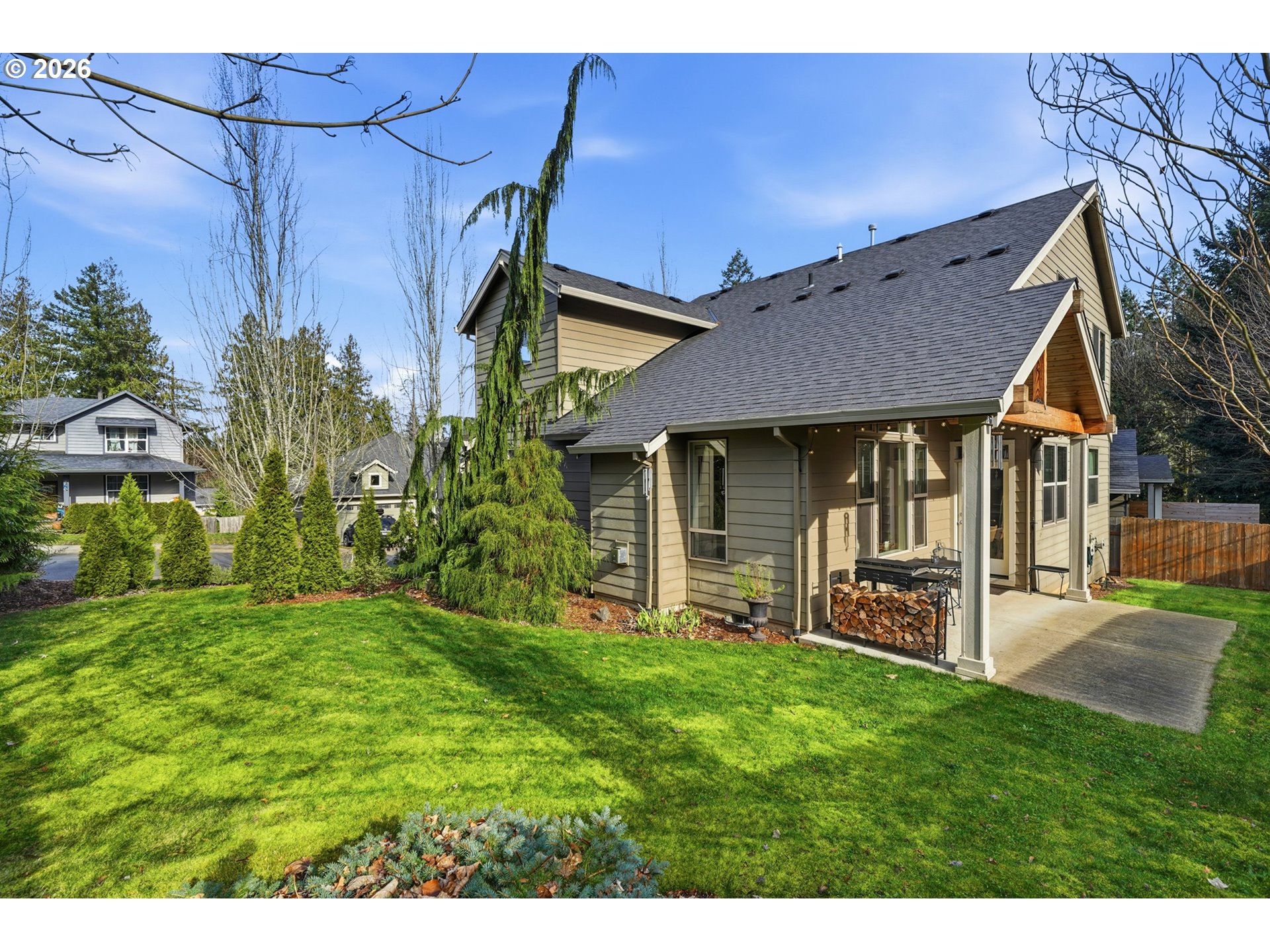 17390 Aubin Street Sandy, OR 97055 - Photo 38 of 41 a view of a house with a yard and sitting area