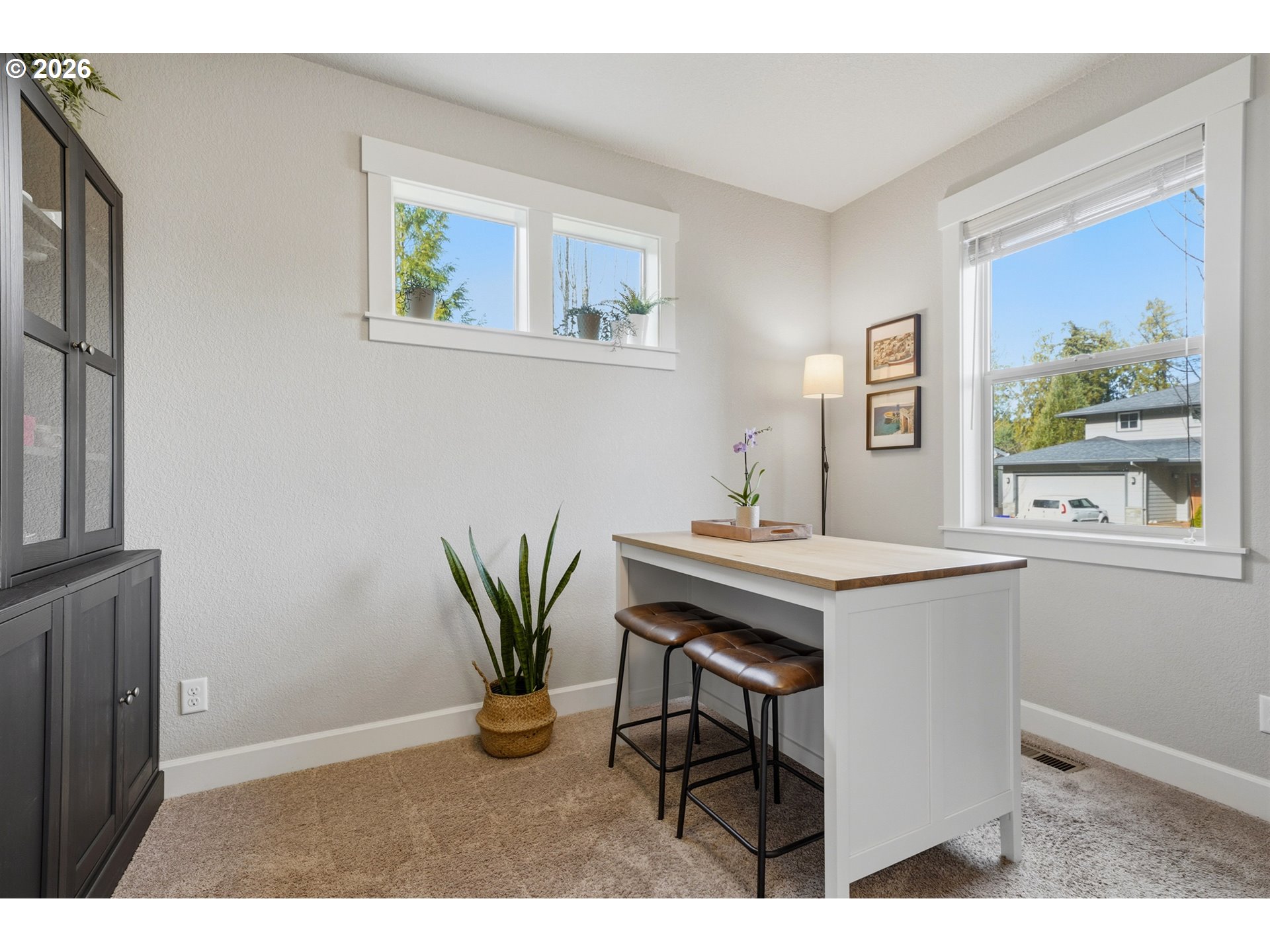 17390 Aubin Street Sandy, OR 97055 - Photo 7 of 41 a view of a dining room with a table and chairs