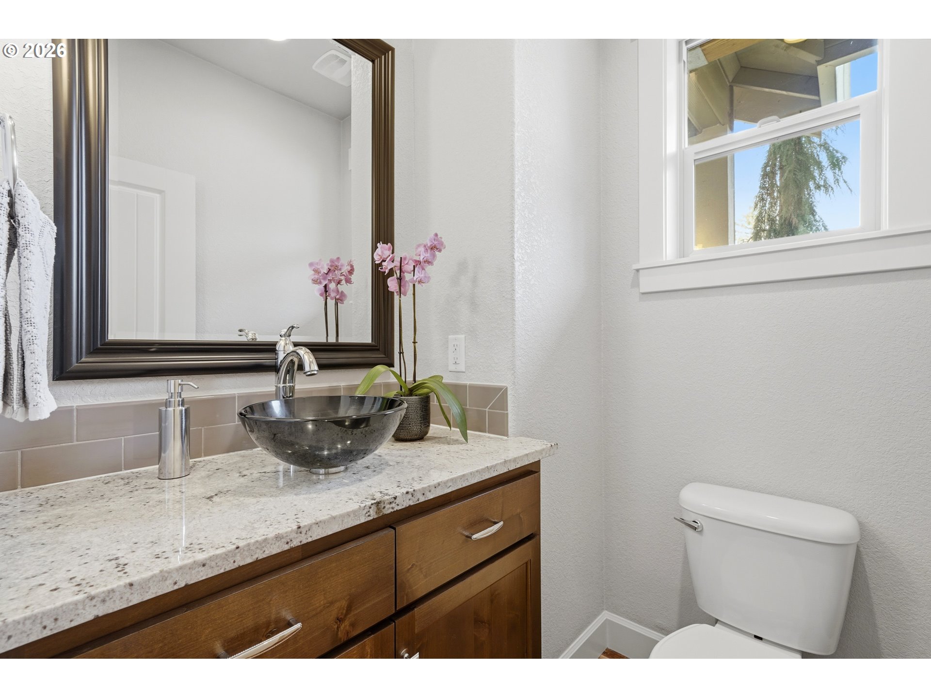 17390 Aubin Street Sandy, OR 97055 - Photo 8 of 41 a bathroom with a granite countertop sink and a mirror