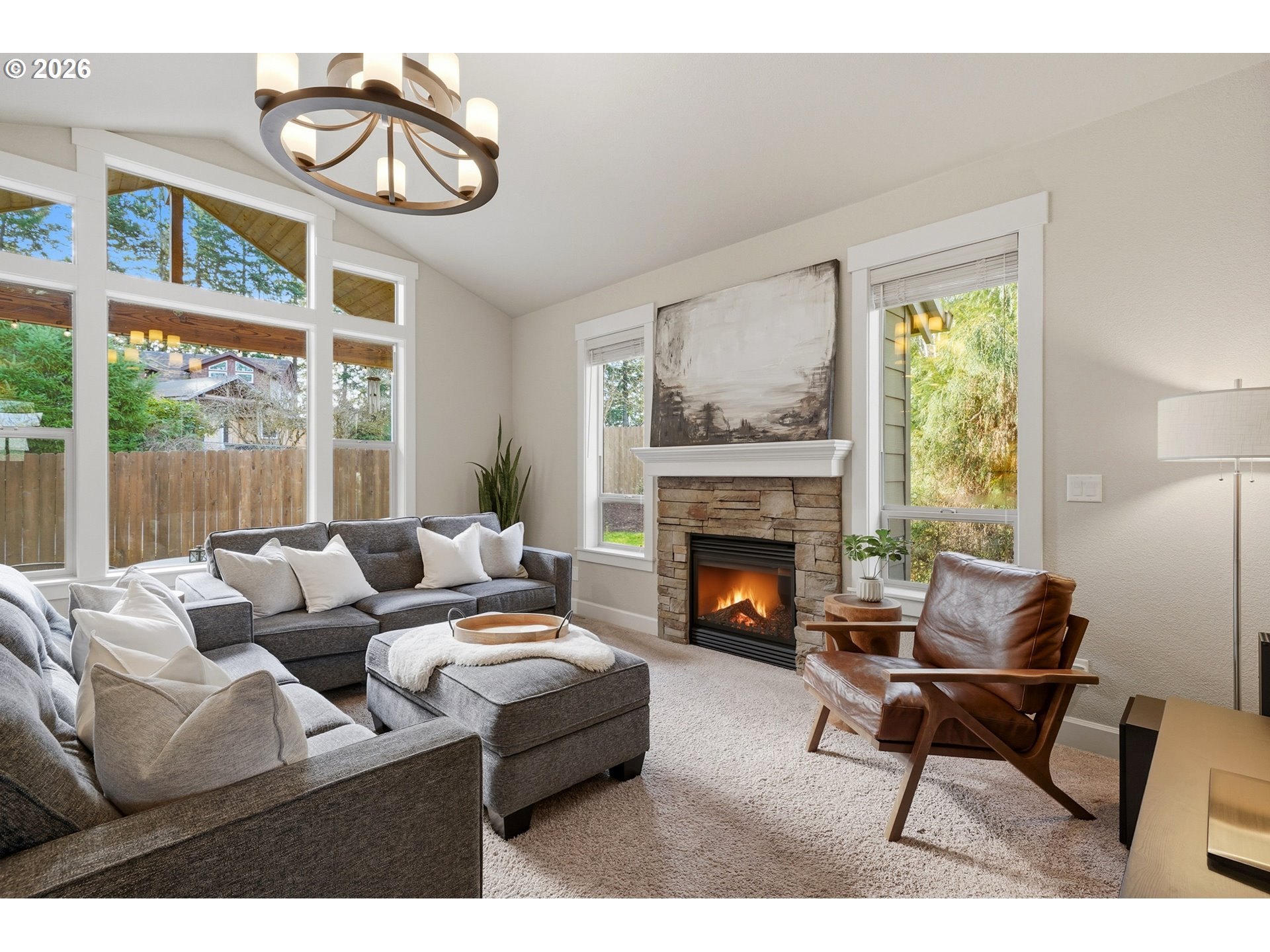17390 Aubin Street Sandy, OR 97055 - Photo 9 of 41 a living room with furniture and a fireplace