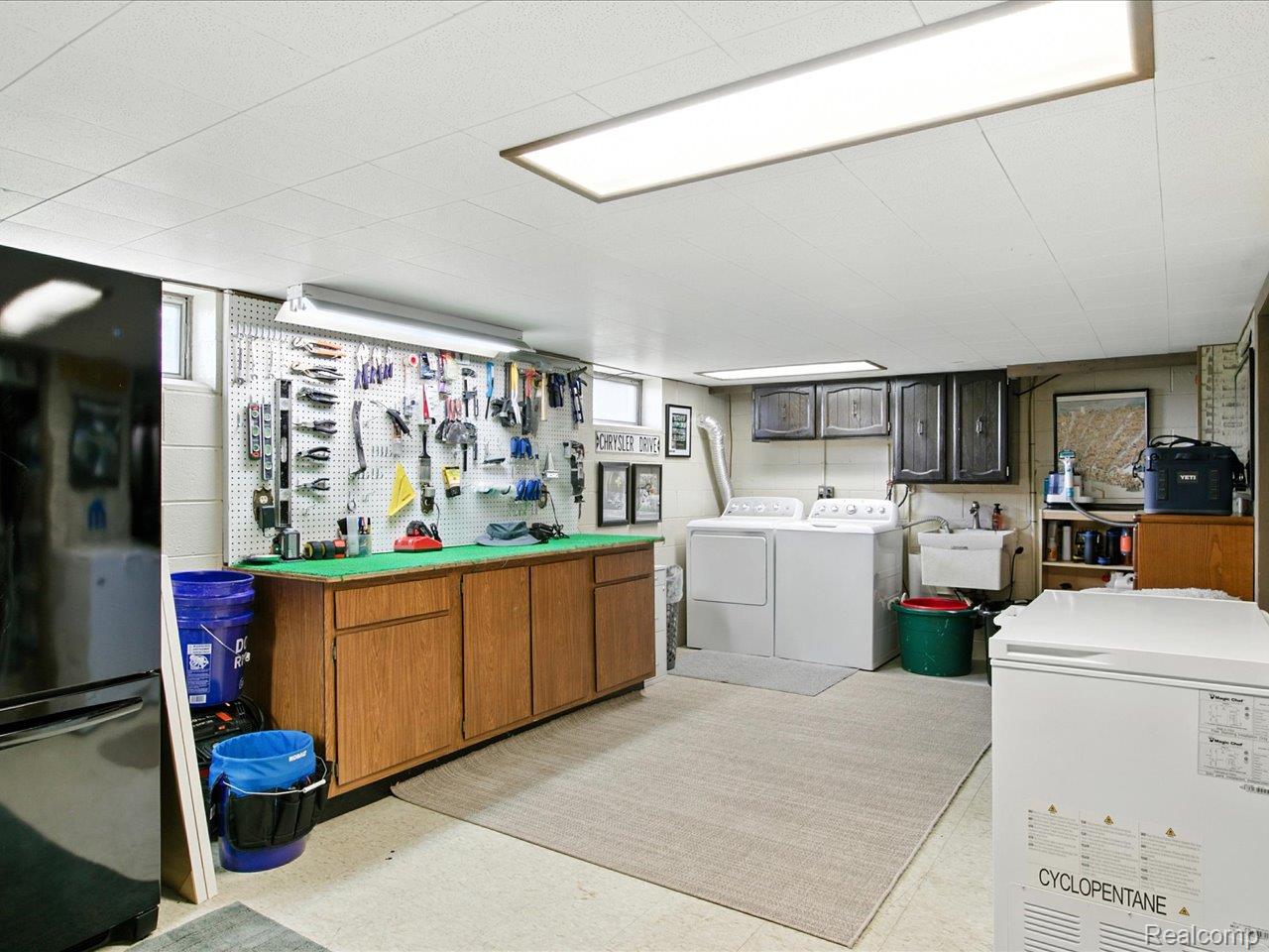 4405 North River Road Fort Gratiot, MI 48059 - Photo 37 of 52 Spacious and bright laundry room with ample storage.