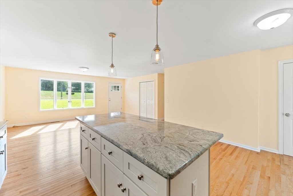 1893 Allen Street Springfield, MA 01128 - Photo 8 of 25 a kitchen with granite countertop sink and refrigerator