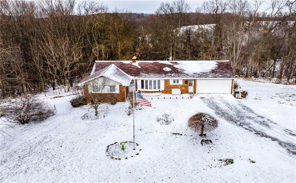 1061 Martin Road Tarentum, PA 15084 - Photo 1 of 25 a view of a house with a backyard