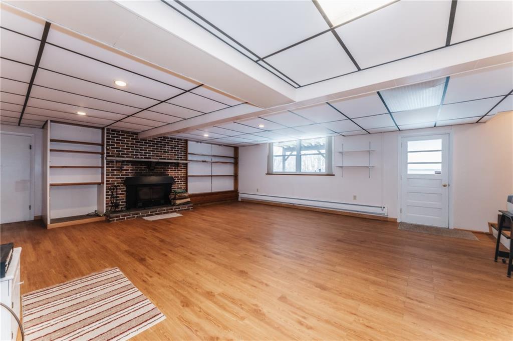 1061 Martin Road Tarentum, PA 15084 - Photo 15 of 25 a view of empty room with a fireplace and windows