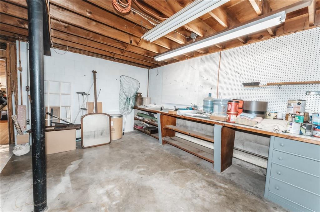 1061 Martin Road Tarentum, PA 15084 - Photo 18 of 25 a kitchen with stainless steel appliances kitchen island granite countertop furniture and a sink