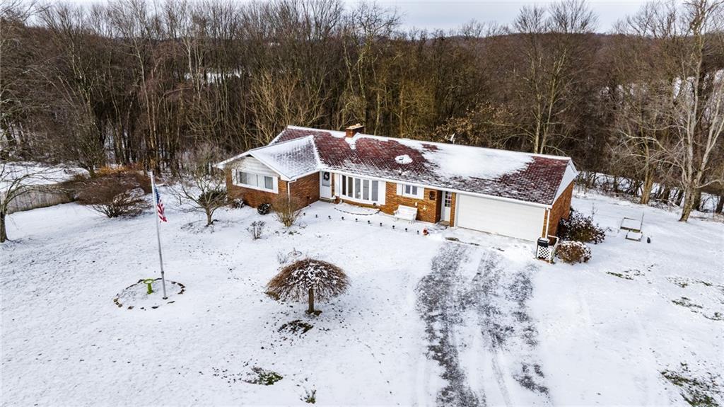 1061 Martin Road Tarentum, PA 15084 - Photo 2 of 25 a view of a backyard with a patio