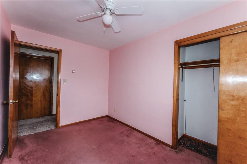 1061 Martin Road Tarentum, PA 15084 - Photo 10 of 25 an empty room with closet and a chandelier fan