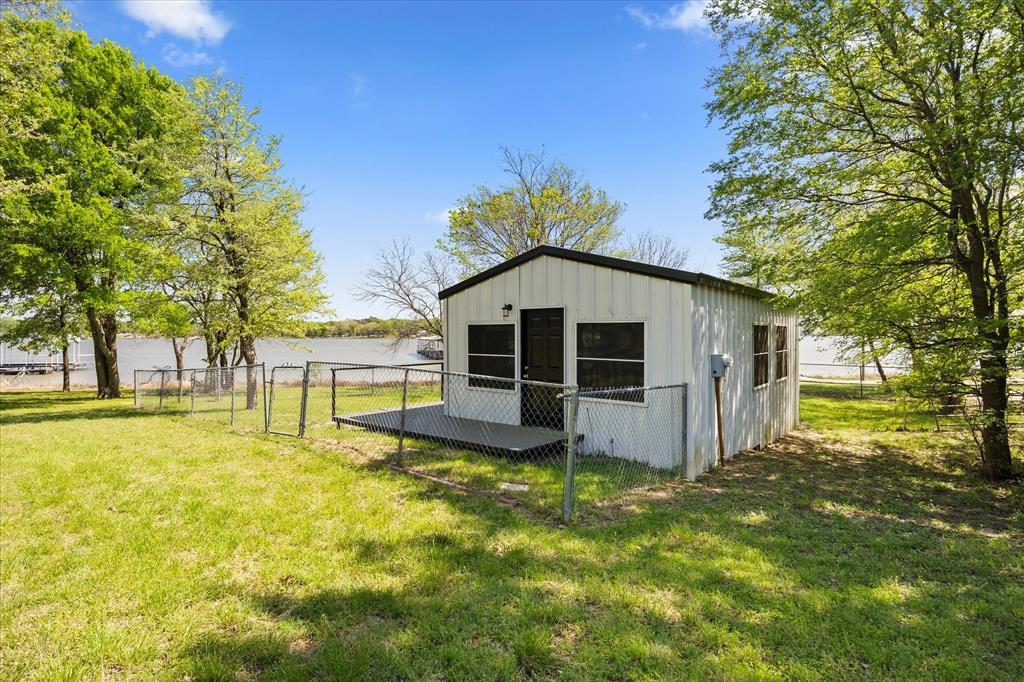 Tbd Waters Edge Quinlan, TX 75474 - Photo 21 of 32 a view of a house with a yard