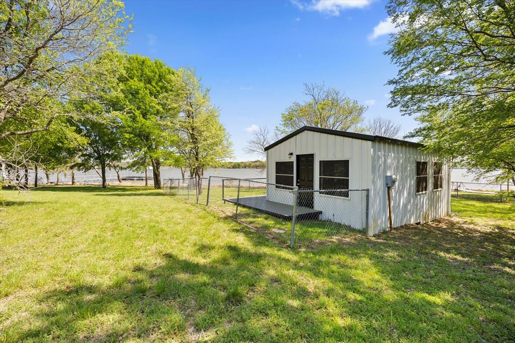 Tbd Waters Edge Quinlan, TX 75474 - Photo 22 of 32 a house view with a garden space