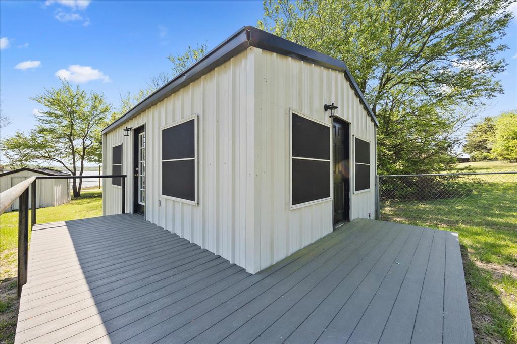 Tbd Waters Edge Quinlan, TX 75474 - Photo 23 of 32 a view of a house with a swimming pool