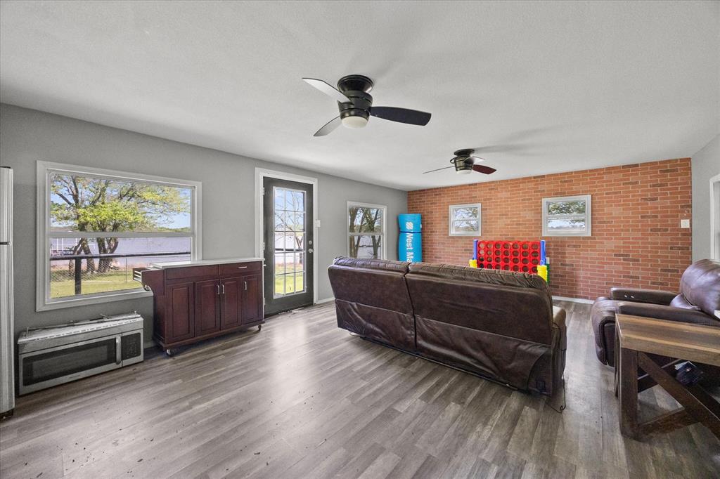 Tbd Waters Edge Quinlan, TX 75474 - Photo 24 of 32 a living room with furniture and a window