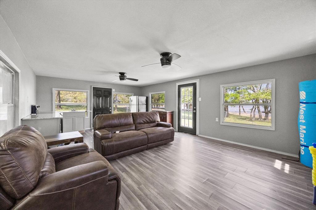 Tbd Waters Edge Quinlan, TX 75474 - Photo 26 of 32 a living room with furniture and a window