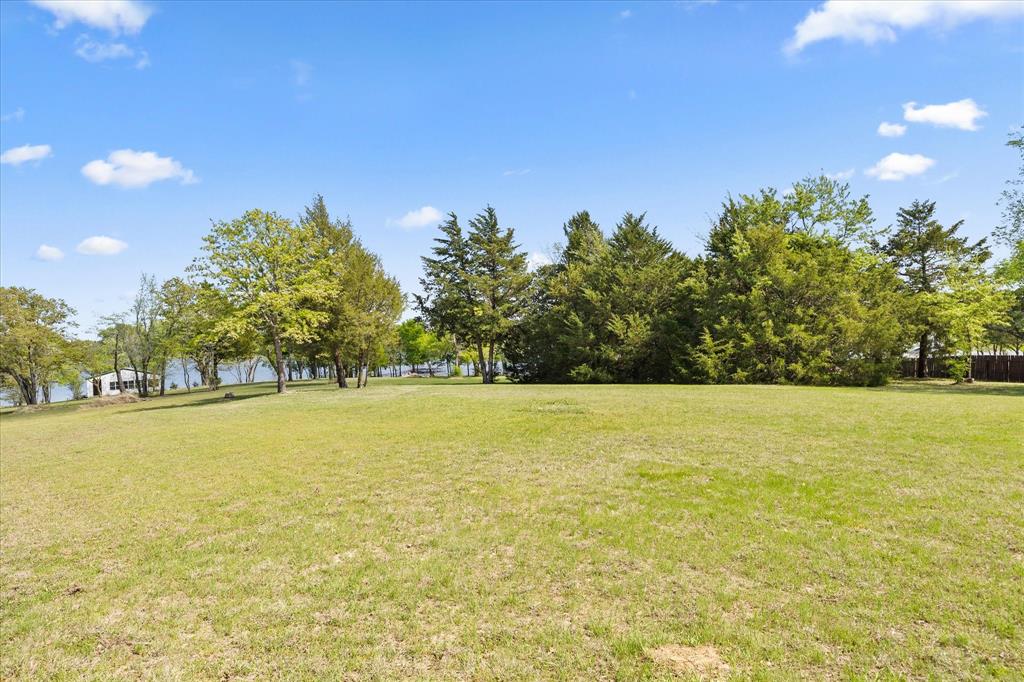 Tbd Waters Edge Quinlan, TX 75474 - Photo 30 of 32 a view of an ocean and trees