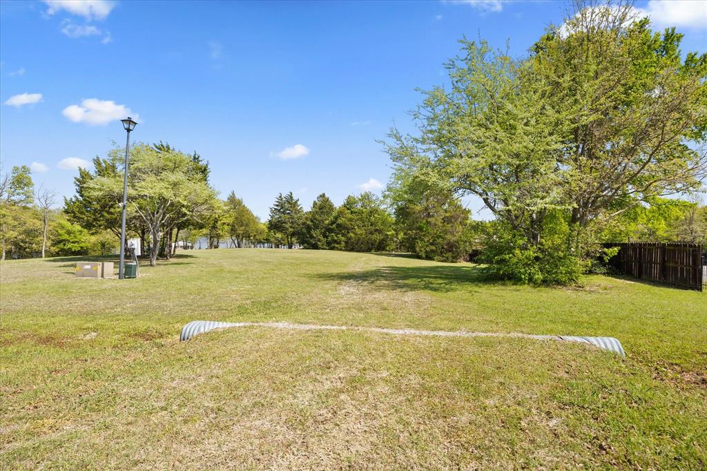 Tbd Waters Edge Quinlan, TX 75474 - Photo 31 of 32 a view of a yard with a house