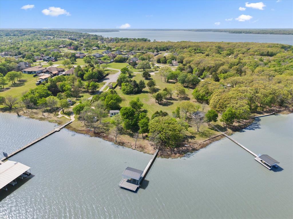 Tbd Waters Edge Quinlan, TX 75474 - Photo 10 of 32 an aerial view of a residential houses with an outdoor space and seating