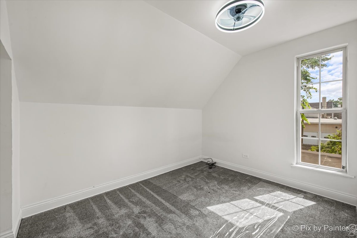 309 Griswold Street Elgin, IL 60123 - Photo 22 of 39 an empty room with a window