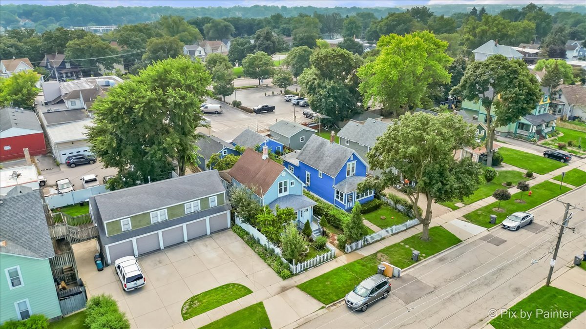 309 Griswold Street Elgin, IL 60123 - Photo 26 of 39 an aerial view of a house with a yard