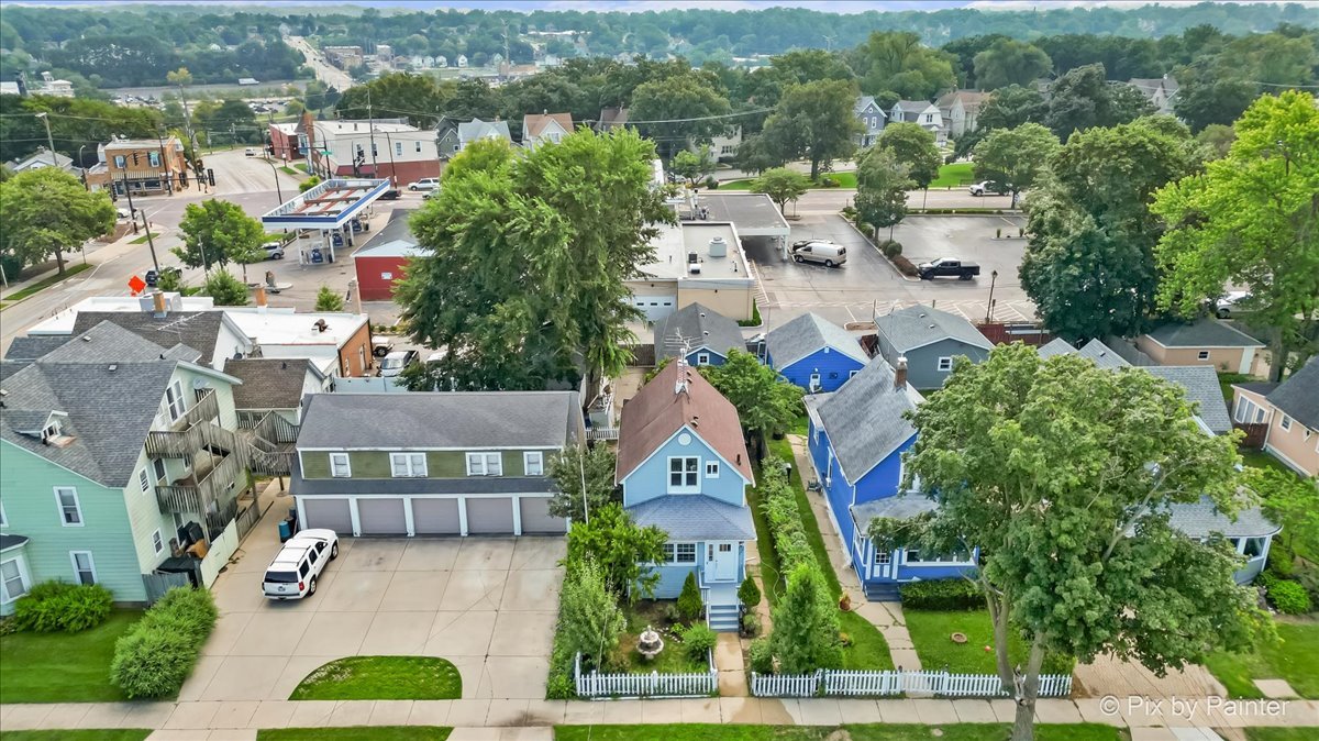 309 Griswold Street Elgin, IL 60123 - Photo 27 of 39 an aerial view of residential houses with outdoor space and parking