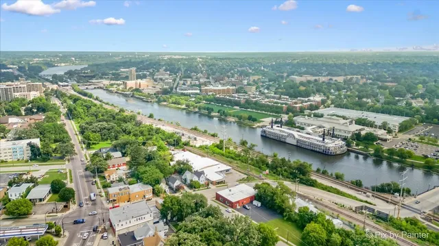 an aerial view of a city with lake view
