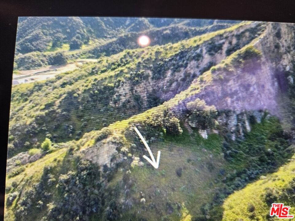 1 Adams Way, Unit 55 Val Verde, CA 91384 - Photo 2 of 4 a view of a yard