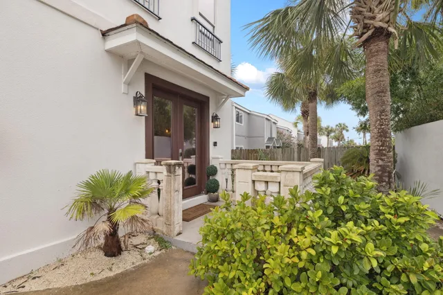 a large kitchen with a sink and cabinets