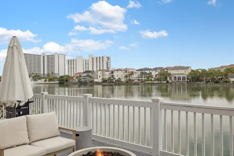 a view of a livingroom with furniture and a flat screen tv