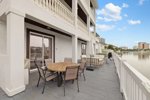 a view of a dining room with furniture and window