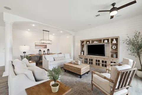 an aerial view of a house with a garden