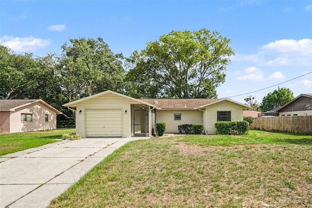 9038 Blackstone Street Spring Hill, FL 34608 - Photo 1 of 31