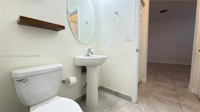 a view of empty room with windows