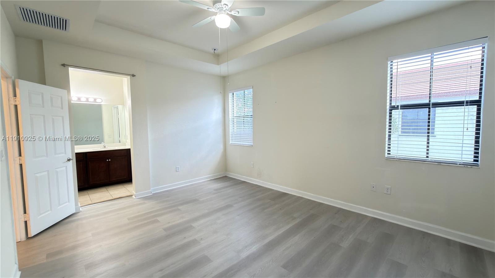 10337 West 34th Lane, Unit 10337 Hialeah, FL 33018 - Photo 28 of 50 a view of an empty room with a window