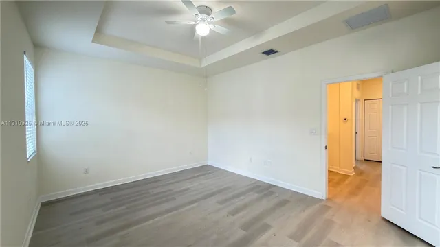 a bathroom with a double vanity sink toilet and shower