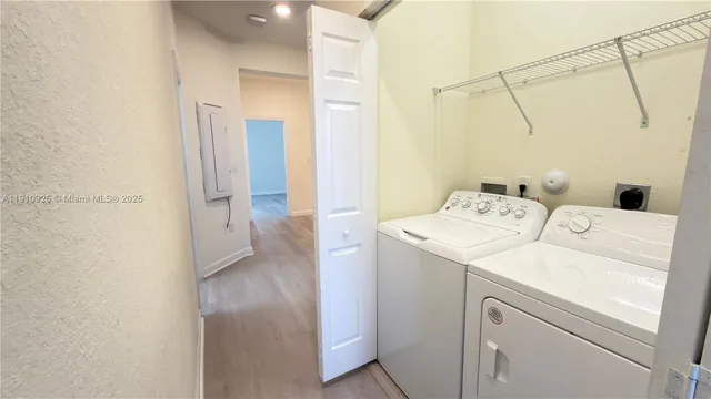 a view of a bathroom from the hallway