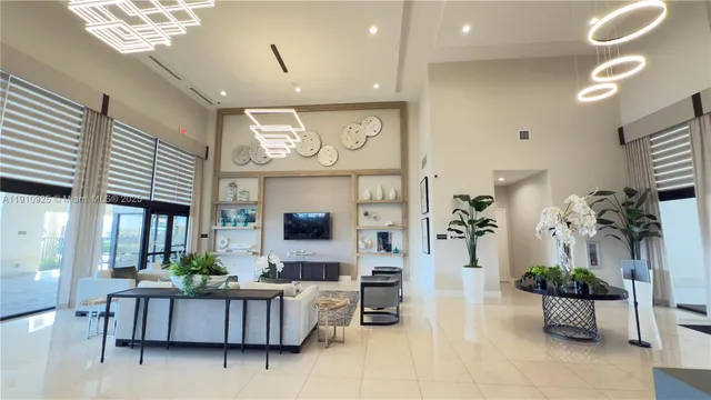 a living room with fireplace furniture and a flat screen tv